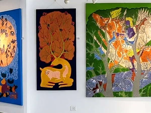 Contemporary Indian paintings displayed in the exhibition gallery at Aakriti Art Gallery